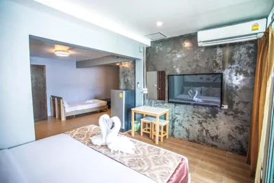 Family Suite with Balcony — Happy 99 Guest house